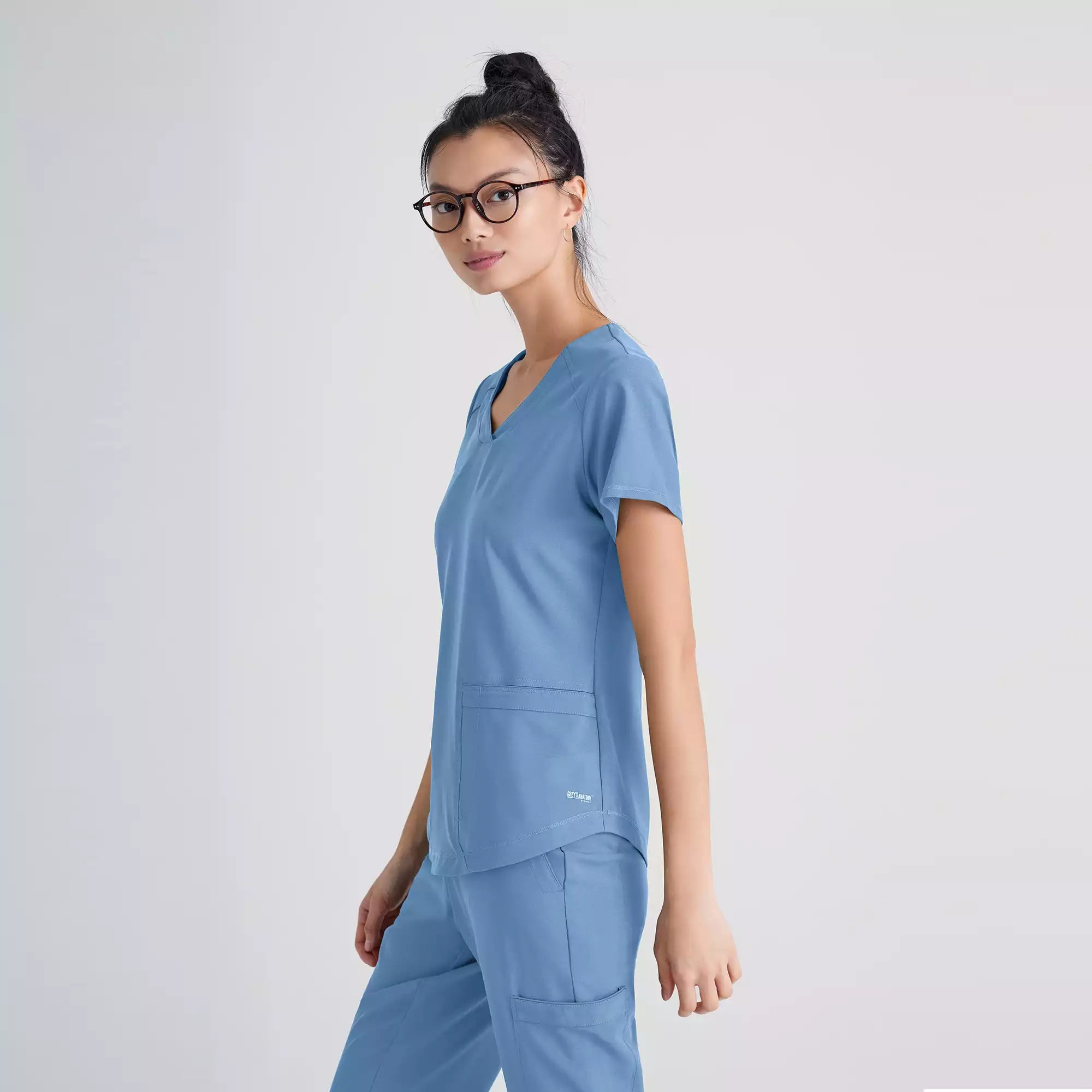 Grey's Anatomy Evolve 2 Pocket Piped V-Neck Top | GSST180