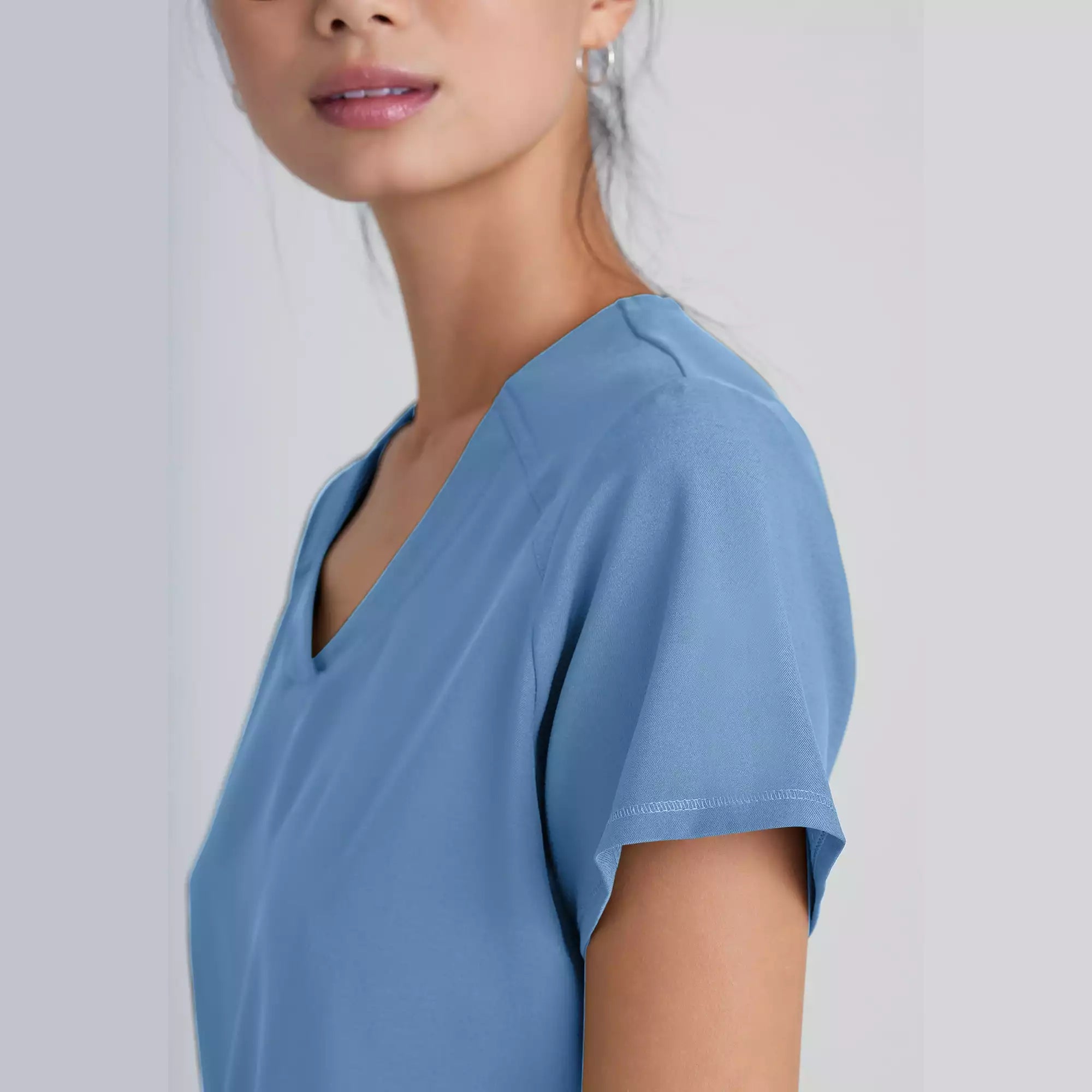 Grey's Anatomy Evolve 2 Pocket Piped V-Neck Top | GSST180