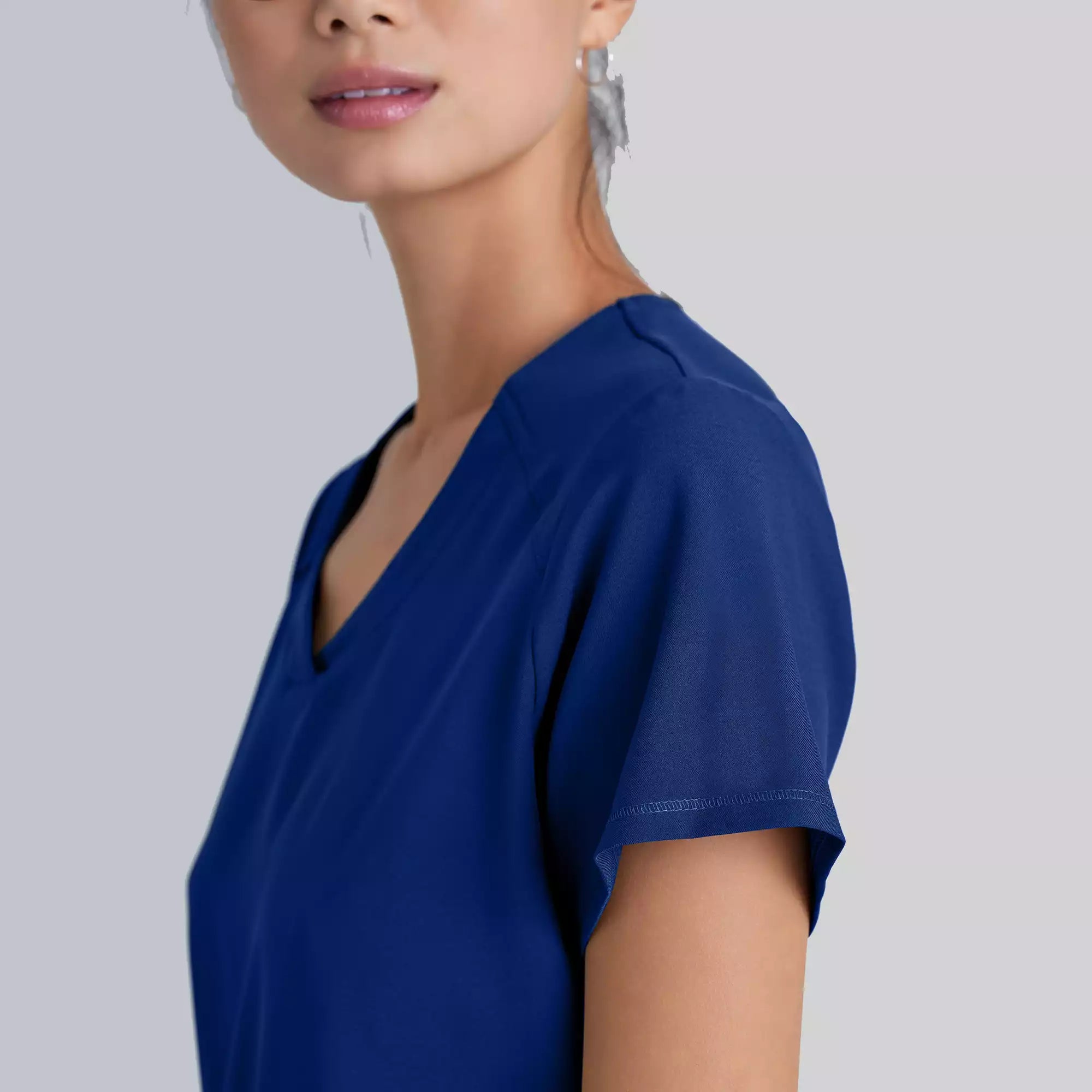Grey's Anatomy Evolve 2 Pocket Piped V-Neck Top | GSST180