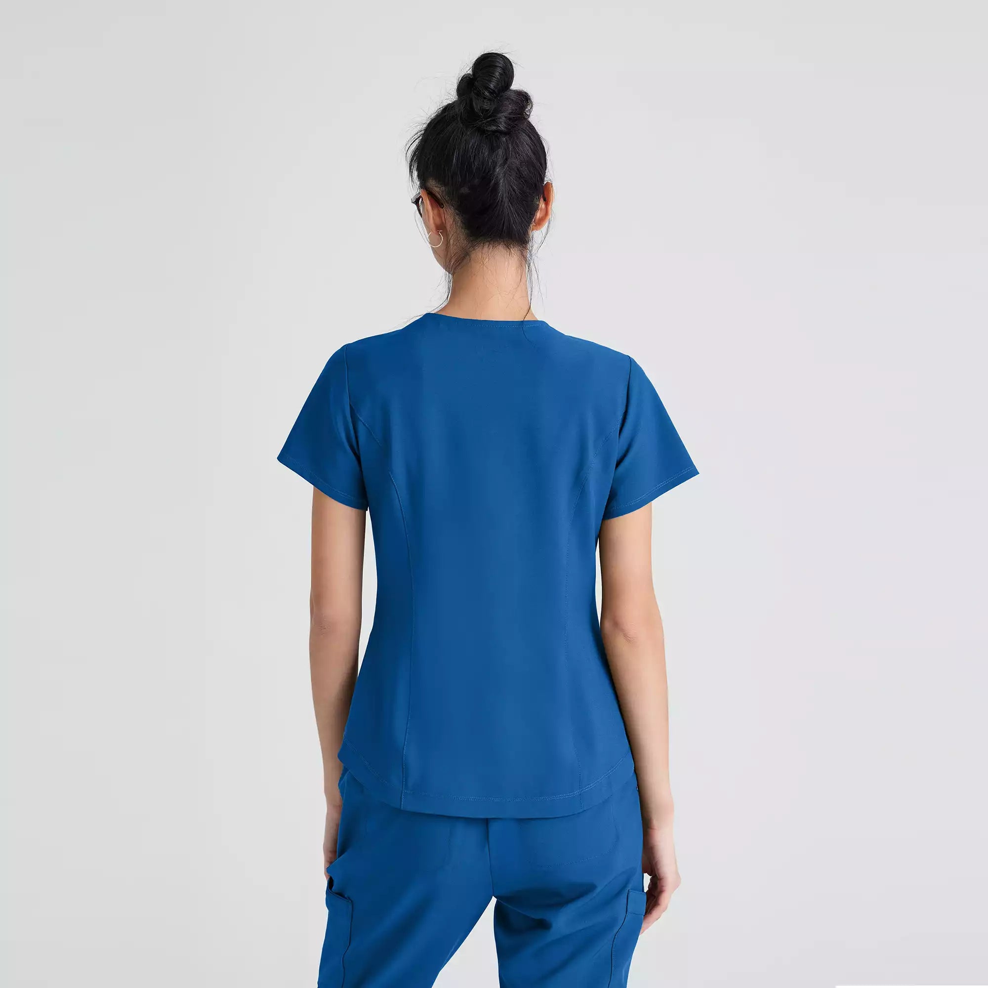 Grey's Anatomy Evolve 2 Pocket Piped V-Neck Top | GSST180