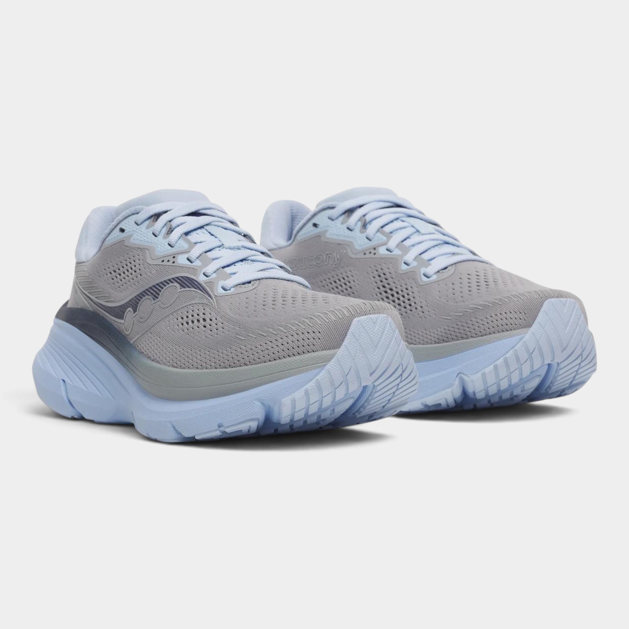A pair of Saucony running shoes in light gray and pale blue, shown from a three-quarters angle on a light gray background.
