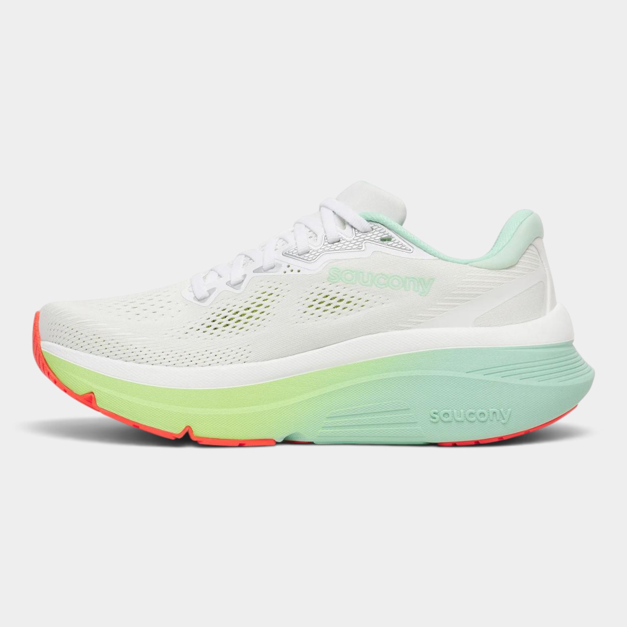 A Saucony running shoe in white mesh with a mint green and neon yellow-green midsole, accented by a bright coral orange outsole, shown from a side profile on a light gray background.