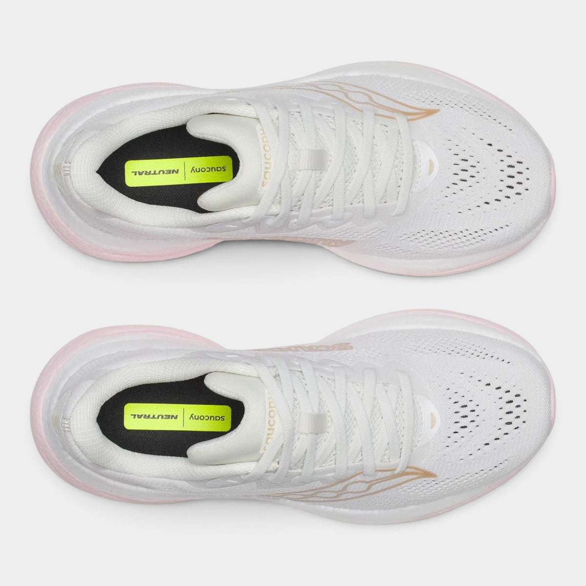 A pair of white running shoes shown from a top-down view on a light gray background. The shoes feature white mesh uppers, white laces, a black and neon yellow interior heel tab, and a light pink outsole.