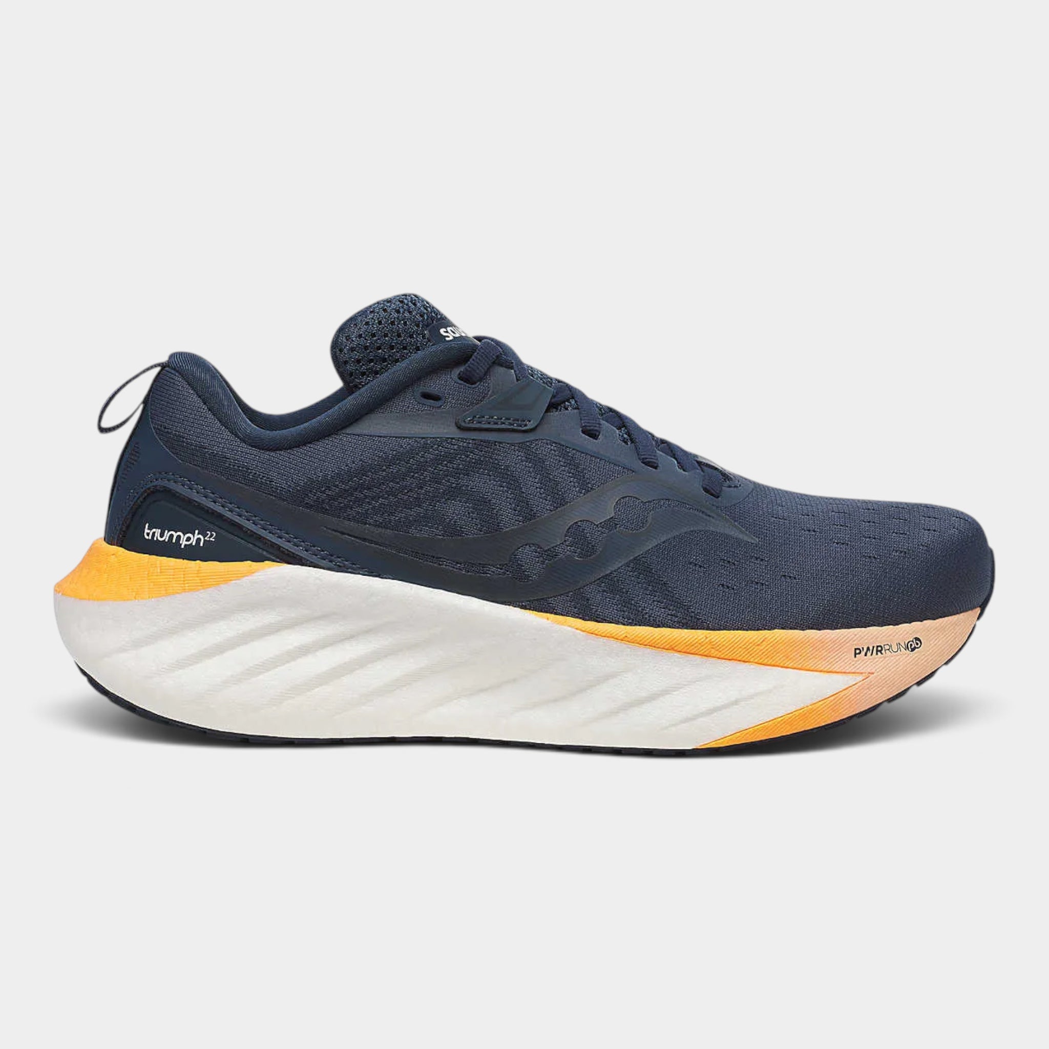 A Saucony running shoe in navy blue with a thick white and orange midsole, shown from a side profile on a light gray background.