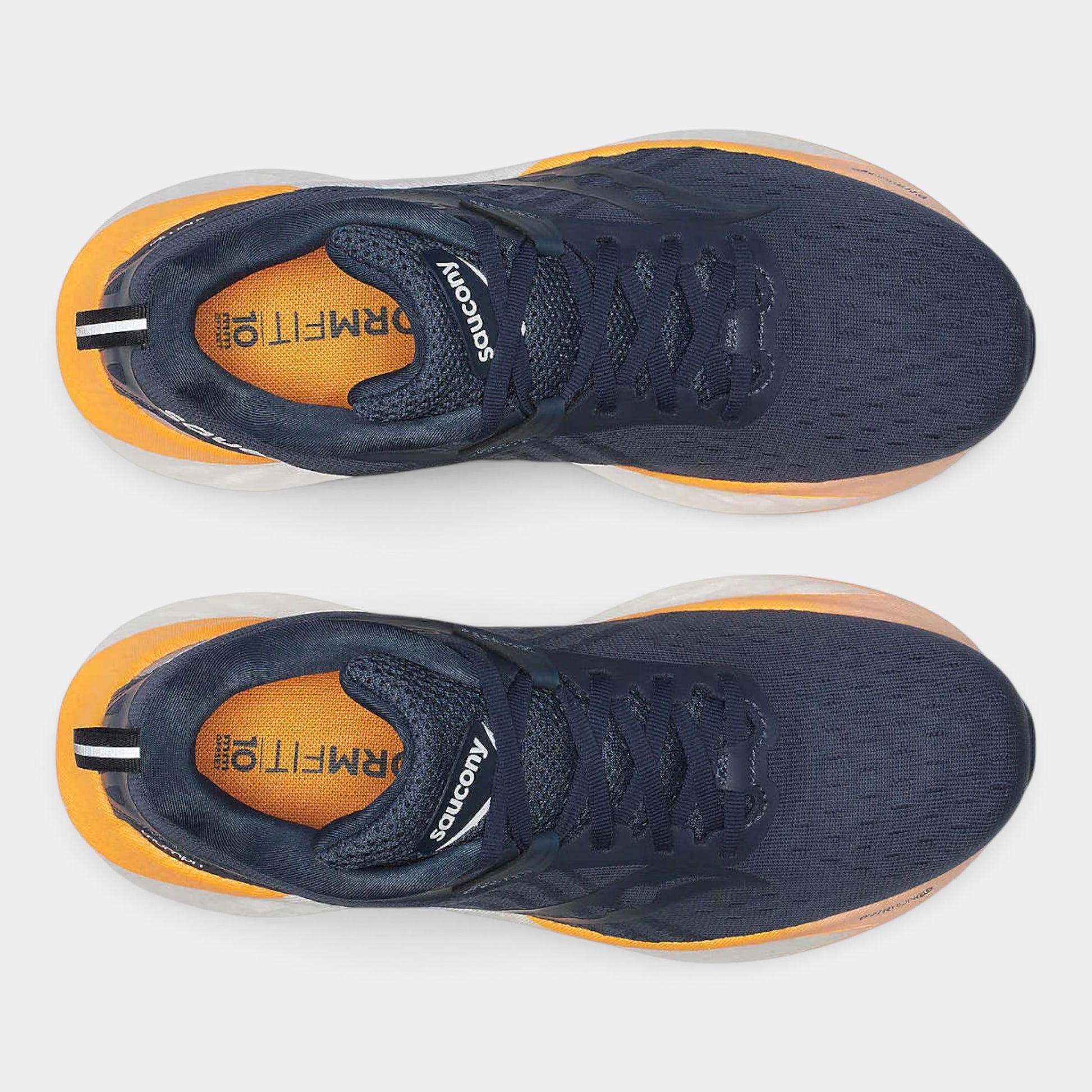 A pair of Saucony running shoes shown from a top-down view, featuring a navy blue mesh upper, bright orange interior lining, and a translucent orange midsole.