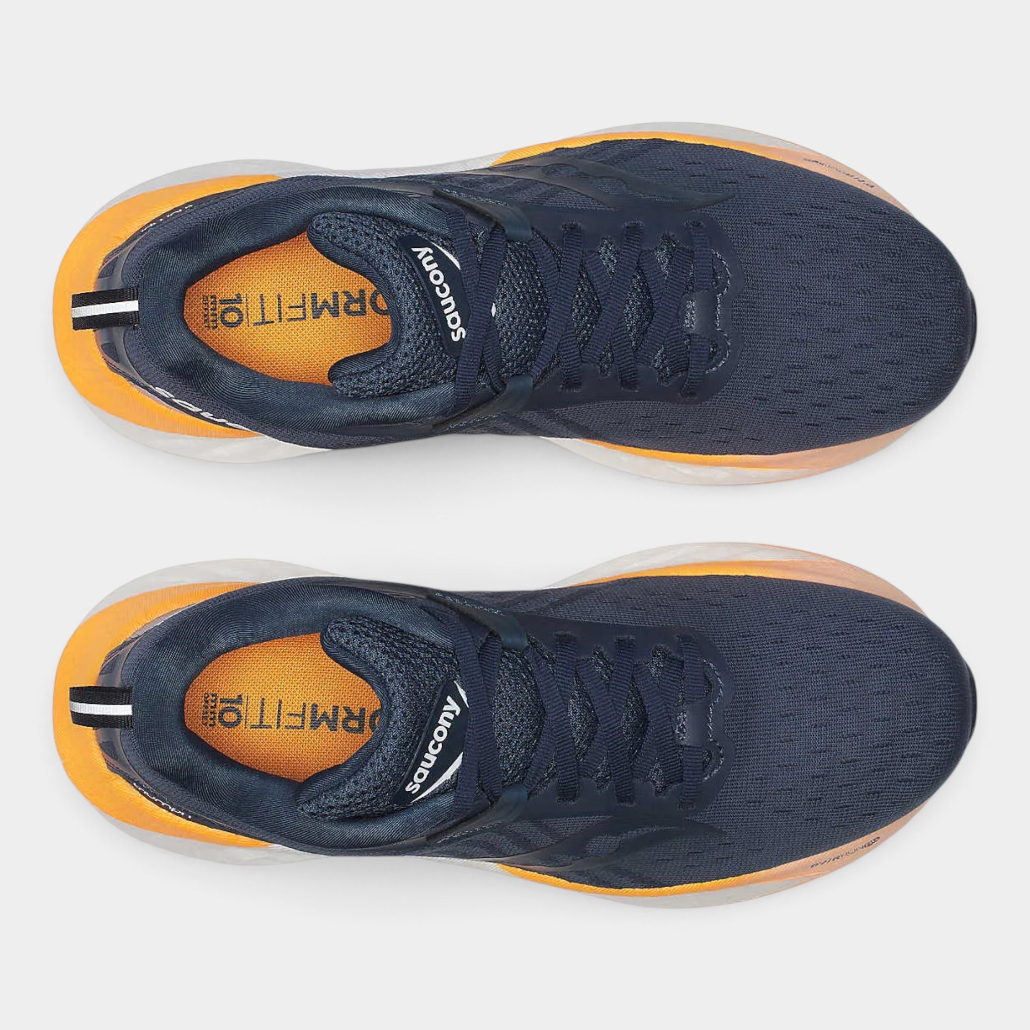 A pair of Saucony running shoes shown from a top-down view, featuring a navy blue mesh upper, bright orange interior lining, and a translucent orange midsole.