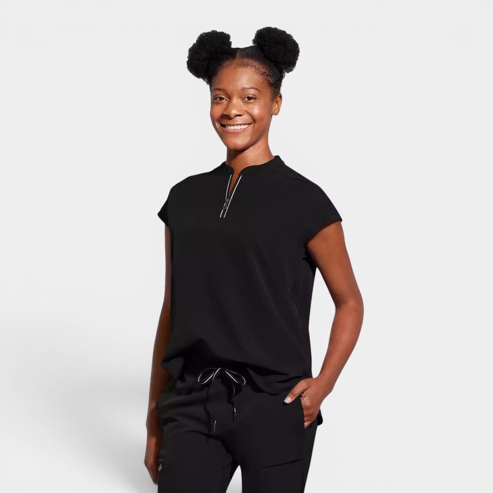 Read's Uniforms black relaxed fit dolman sleeve scrub top with partial zip front and rounded hem.