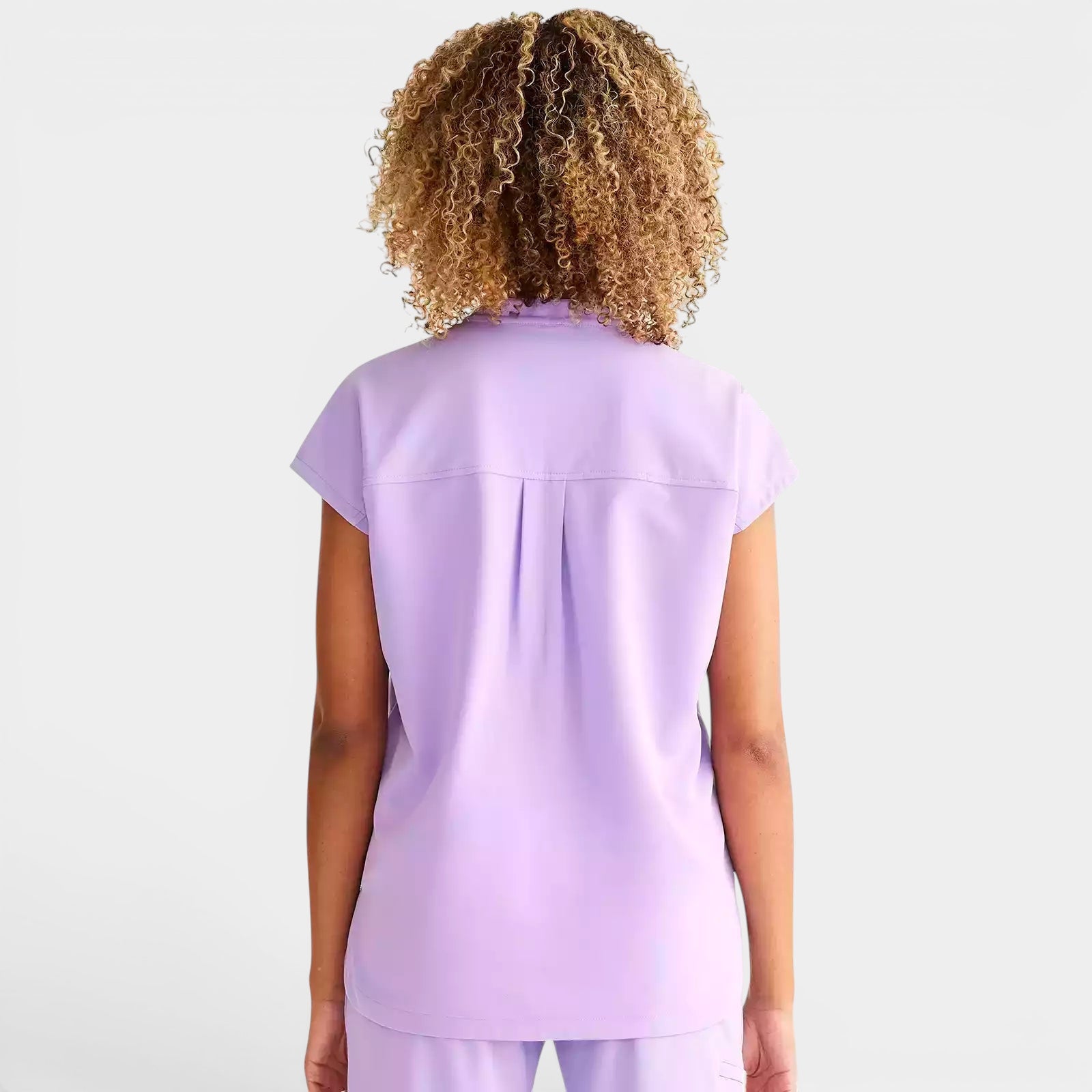 Read's Uniforms light purple relaxed fit dolman sleeve scrub top with side vents and rounded hem.
