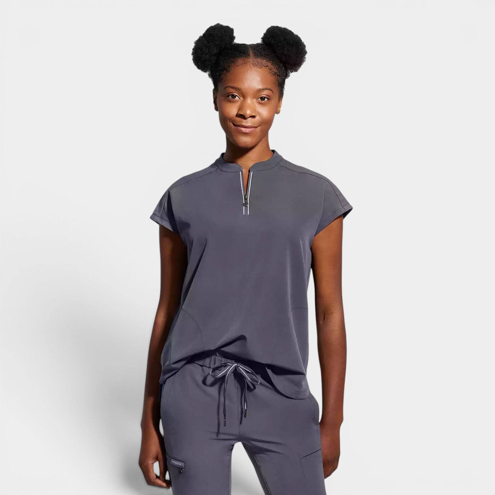 Read's Uniforms dark grey relaxed fit knit scrub top with dolman sleeves, partial zip front, side vents, and rounded hem.