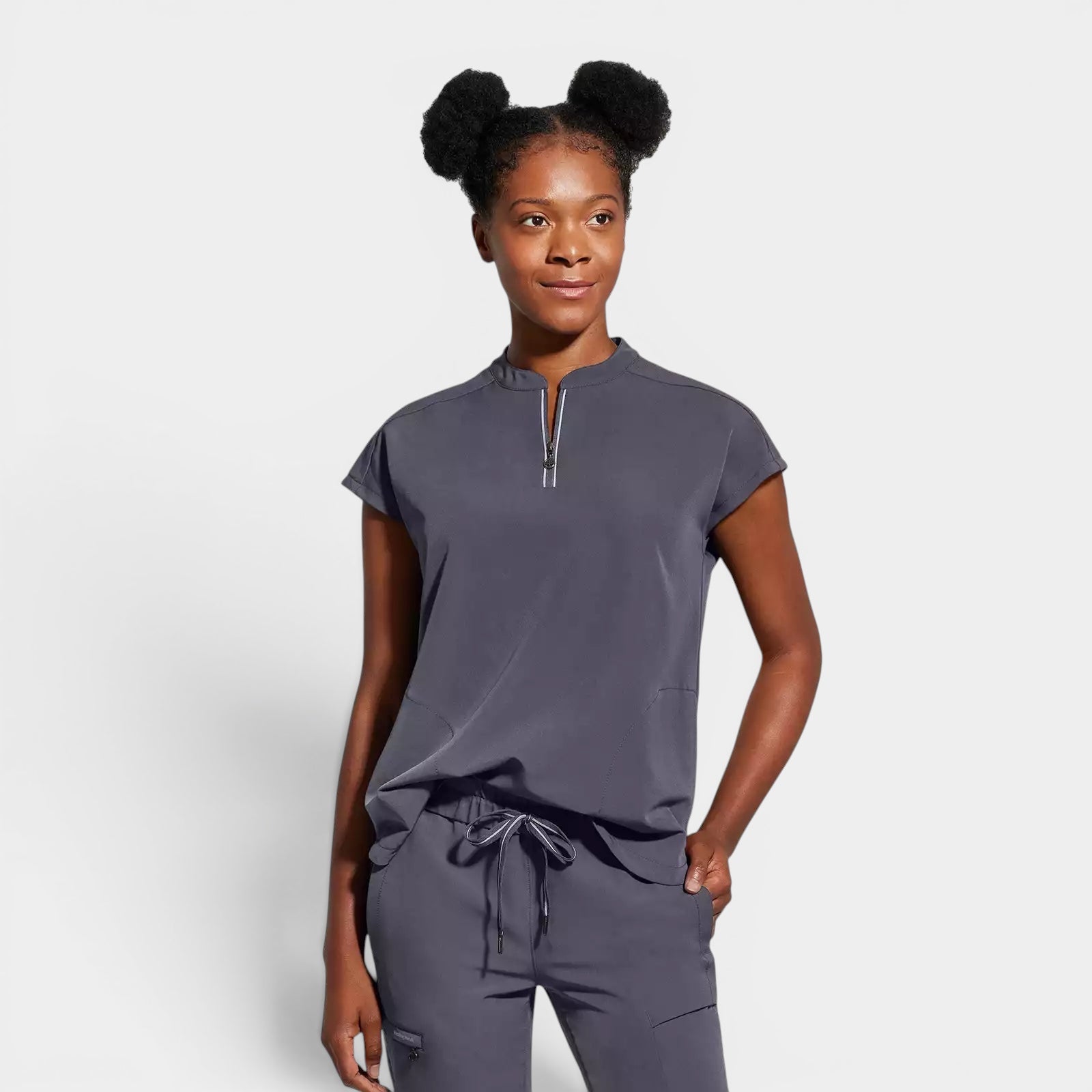 Read's Uniforms dark grey knit scrub top with dolman sleeves, side vents, and partial zip front.