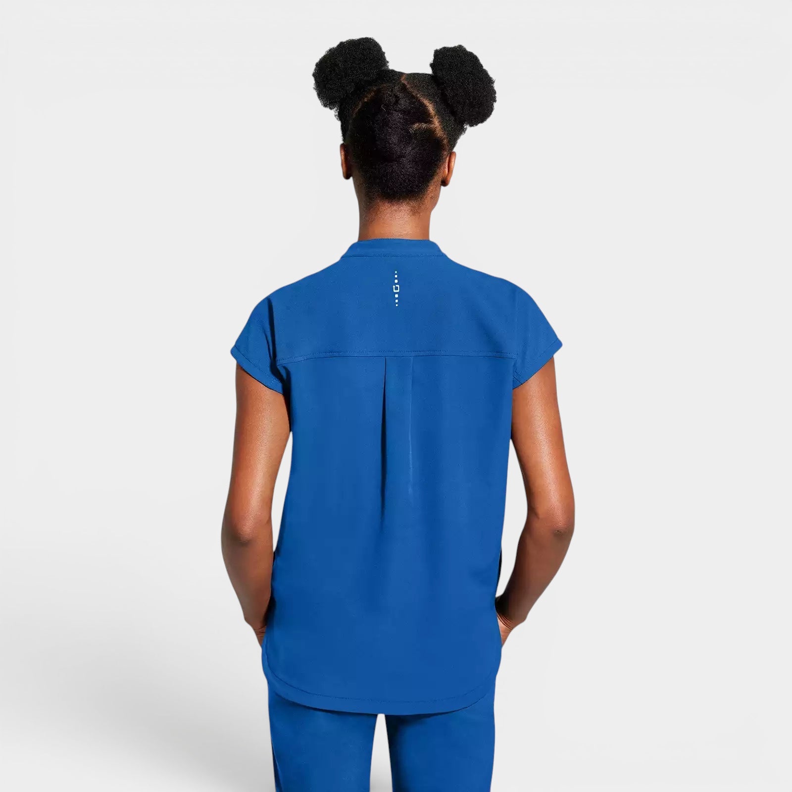Read's Uniforms royal blue relaxed fit knit top with dolman sleeves, side vents, and rounded hem.