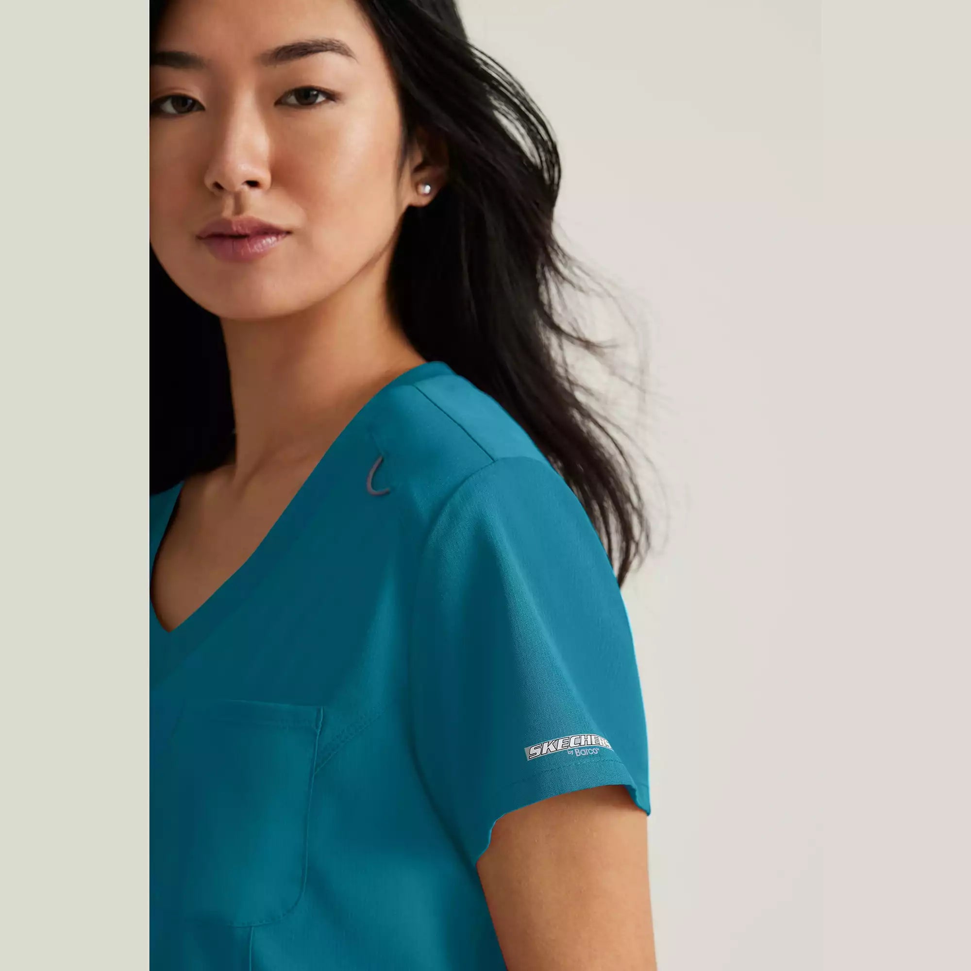 Skechers Women's Single Pocket V-Neck Tuck In Top | SKT147
