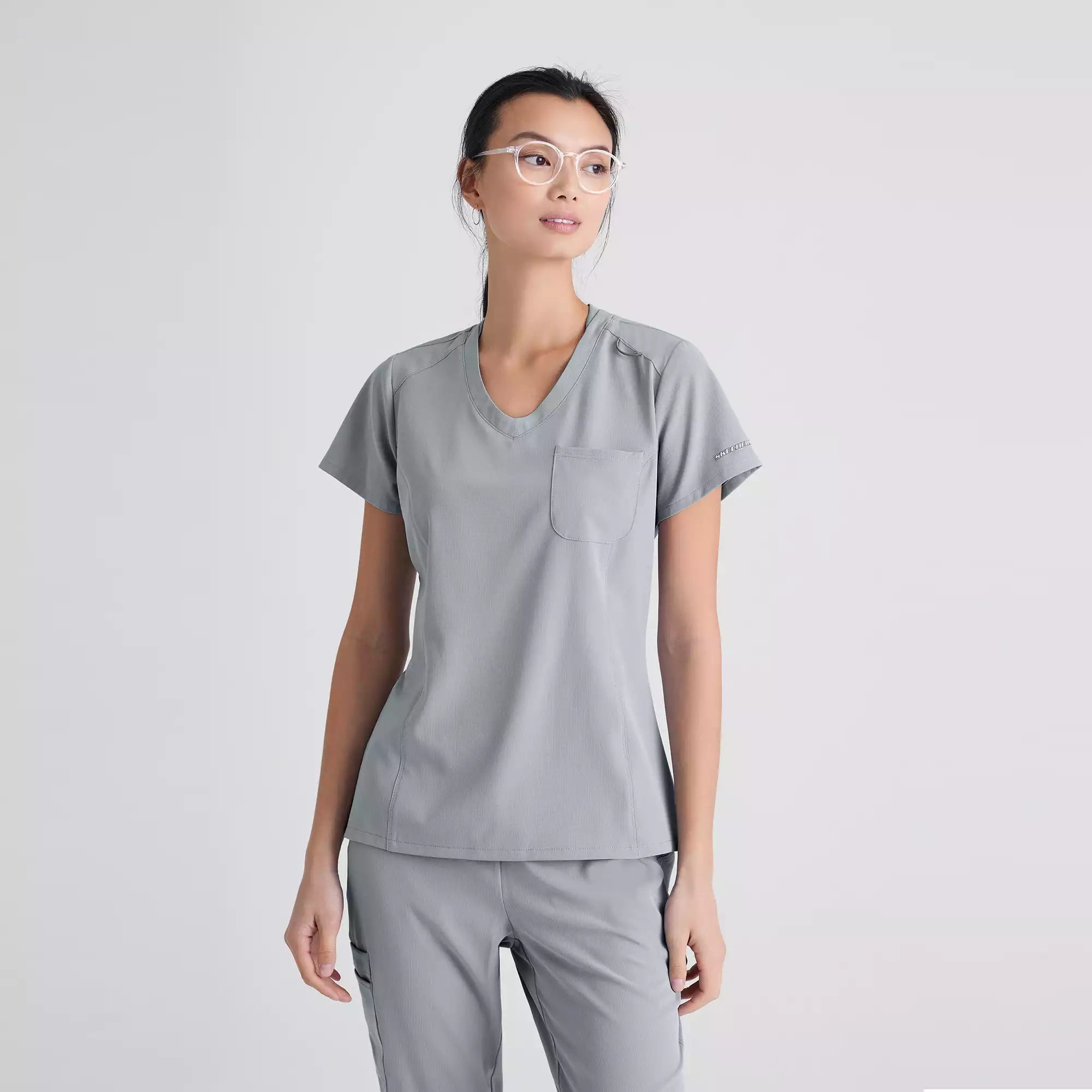 Skechers Women's Single Pocket V-Neck Tuck In Top | SKT147