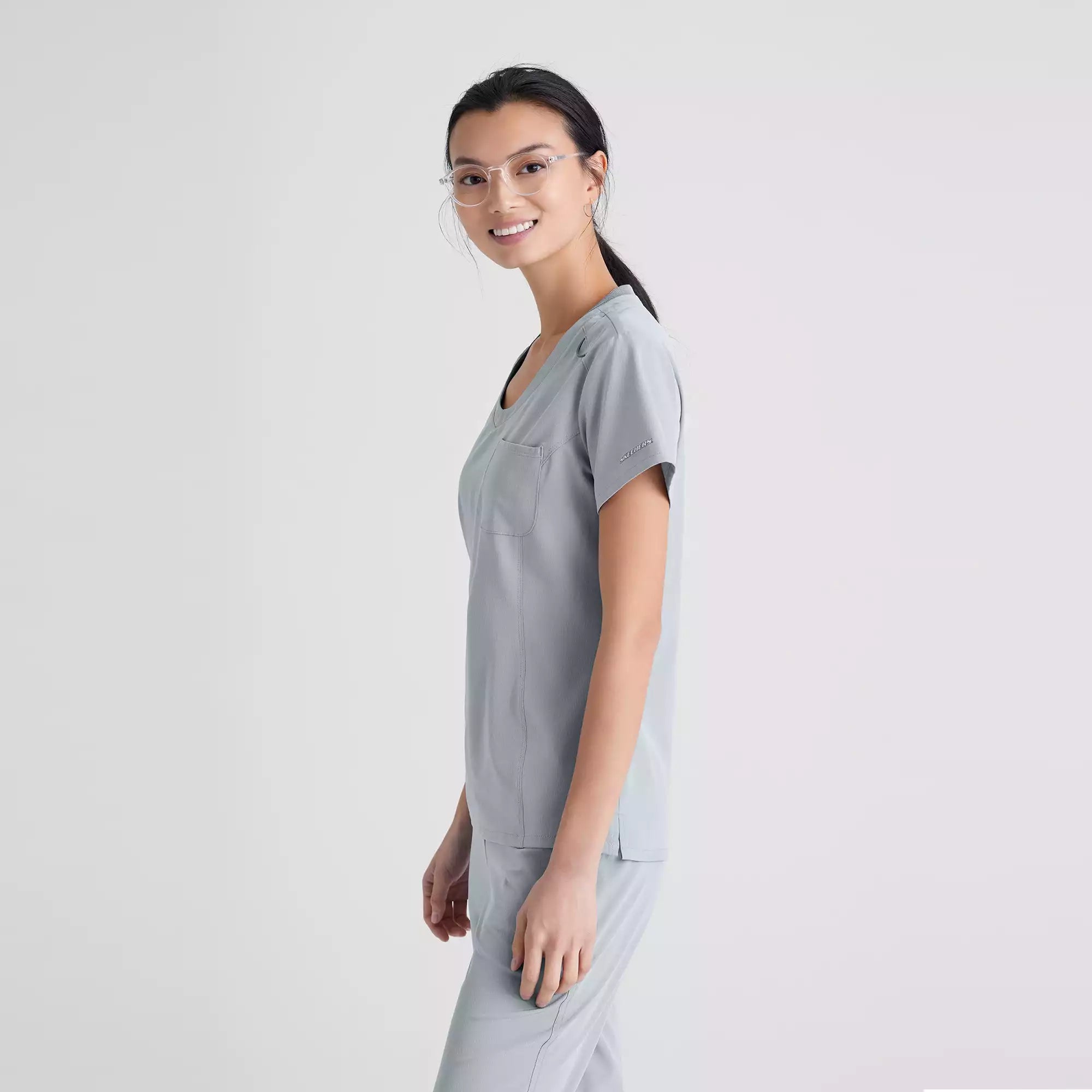 Skechers Women's Single Pocket V-Neck Tuck In Top | SKT147