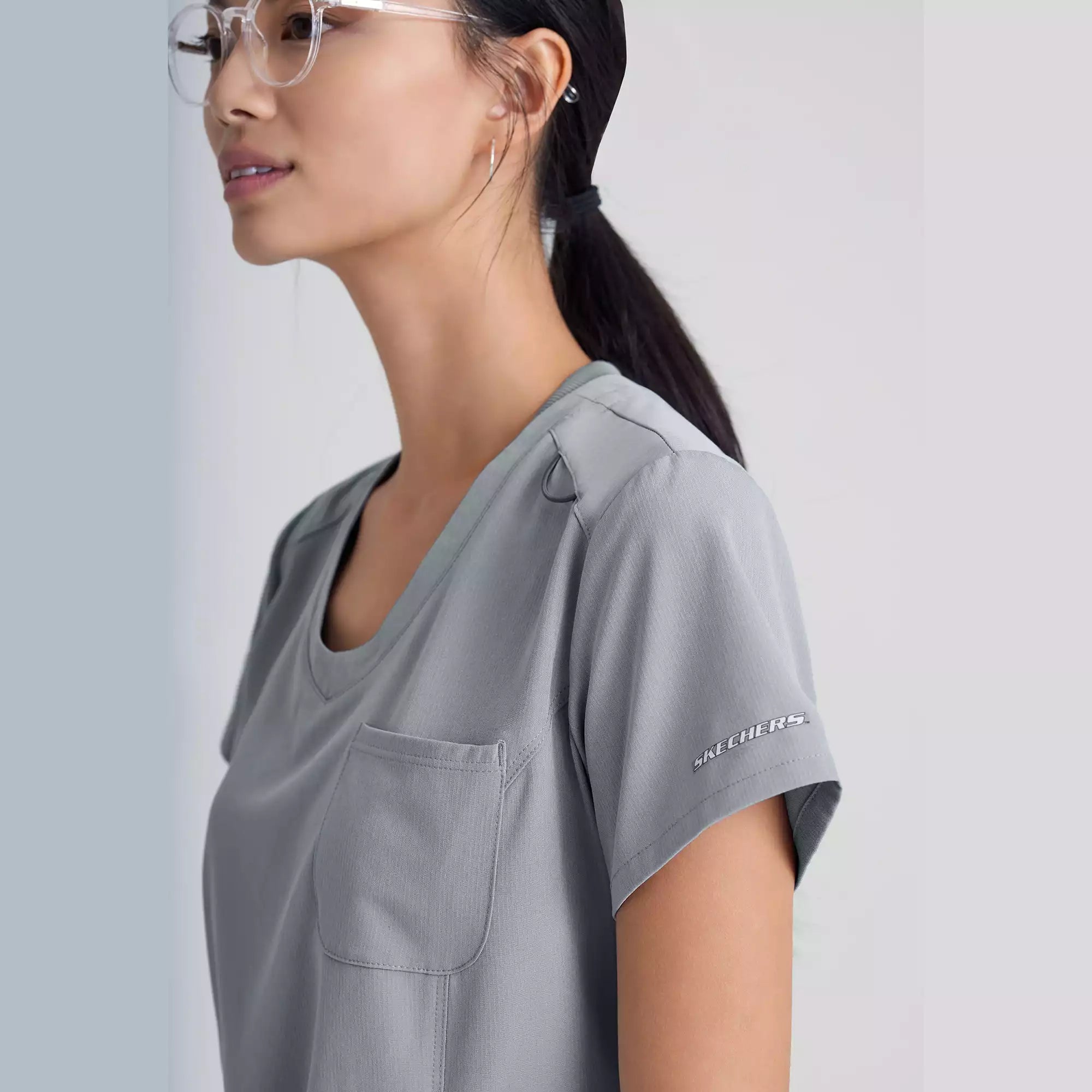 Skechers Women's Single Pocket V-Neck Tuck In Top | SKT147