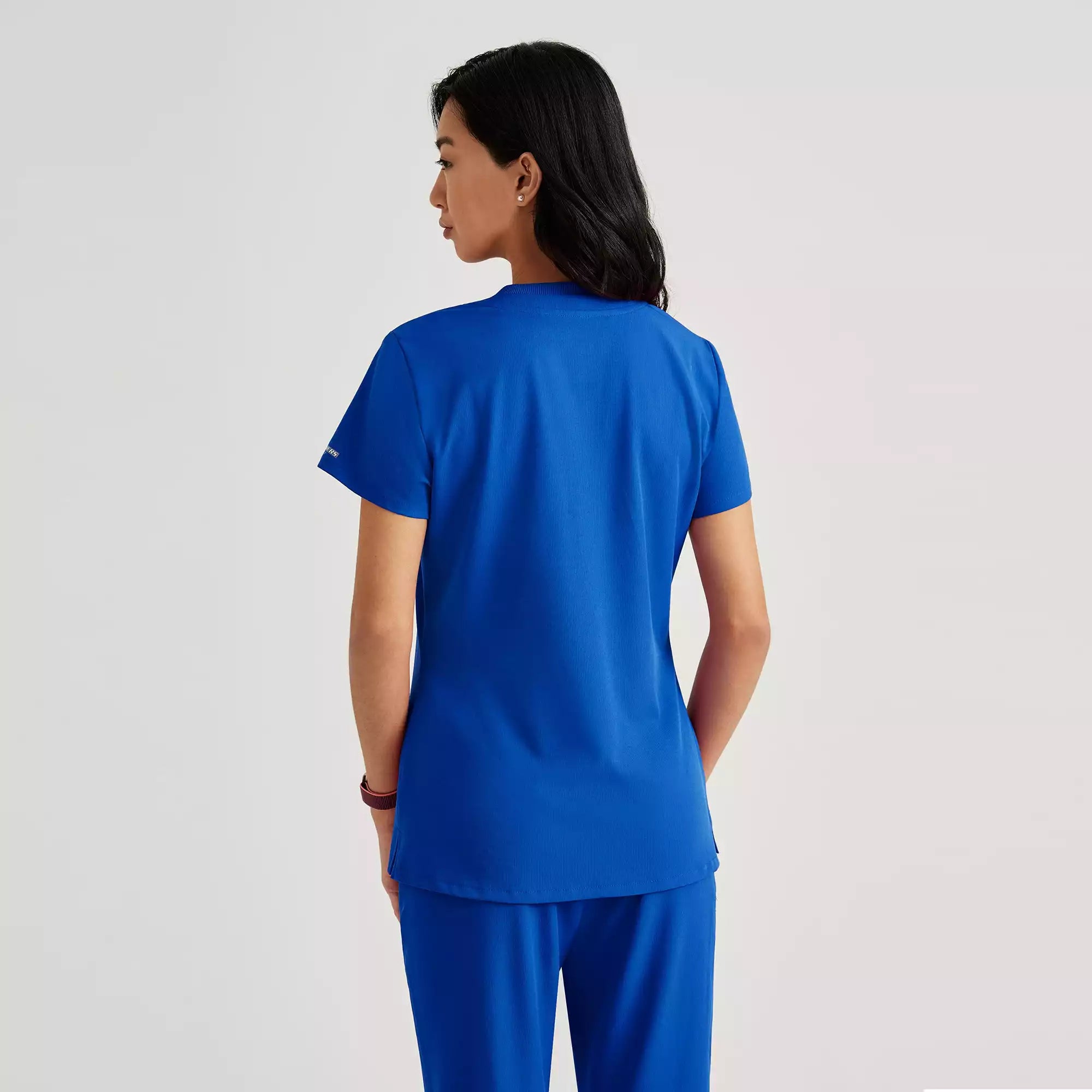 Skechers Women's Single Pocket V-Neck Tuck In Top | SKT147