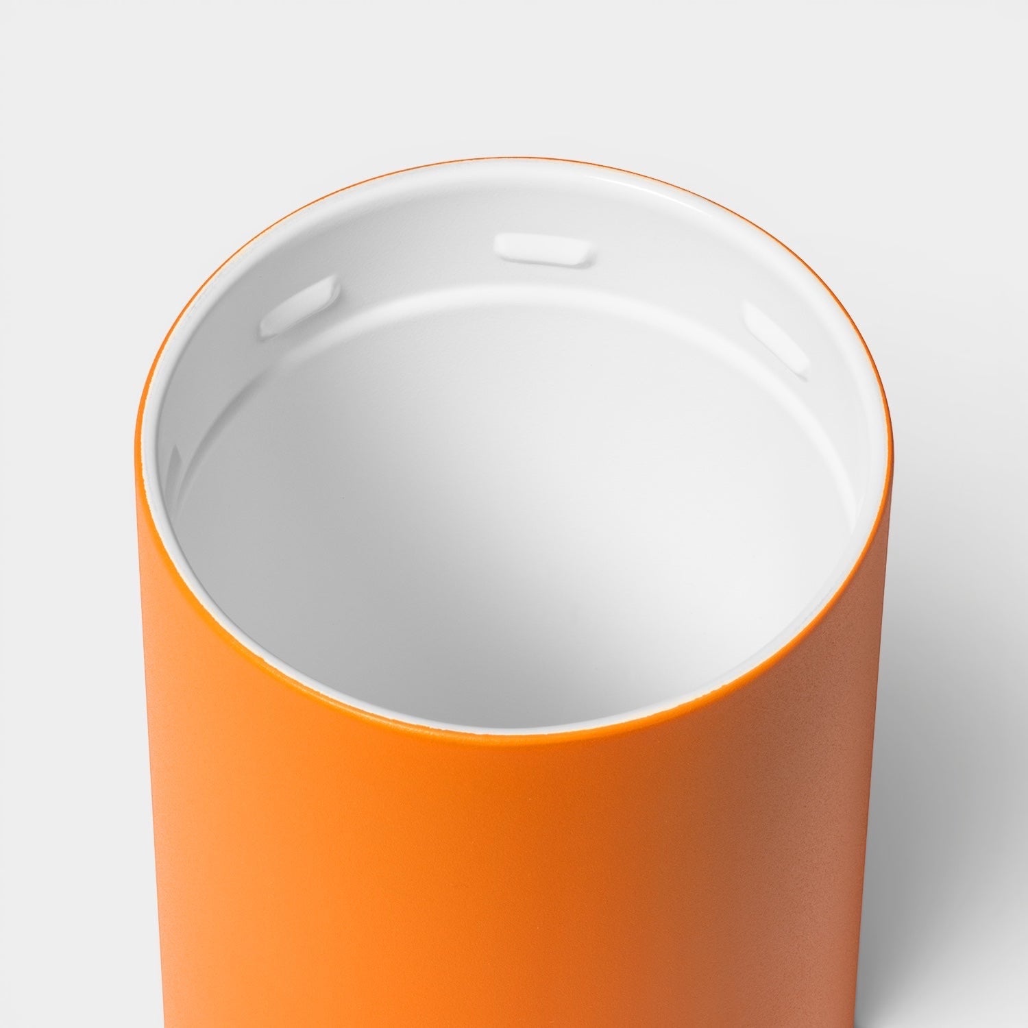 Read's Uniforms Brumate Strova 18oz tumbler showing the ceramic-lined interior and orange exterior finish.