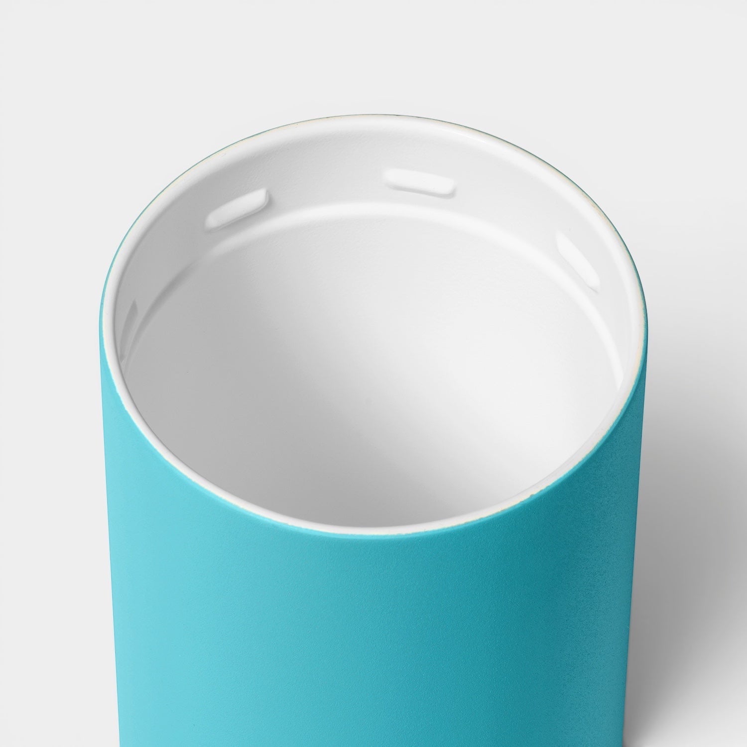 Read's Uniforms Brumate Strova 18oz tumbler showing the white ceramic-lined interior and bright blue exterior.