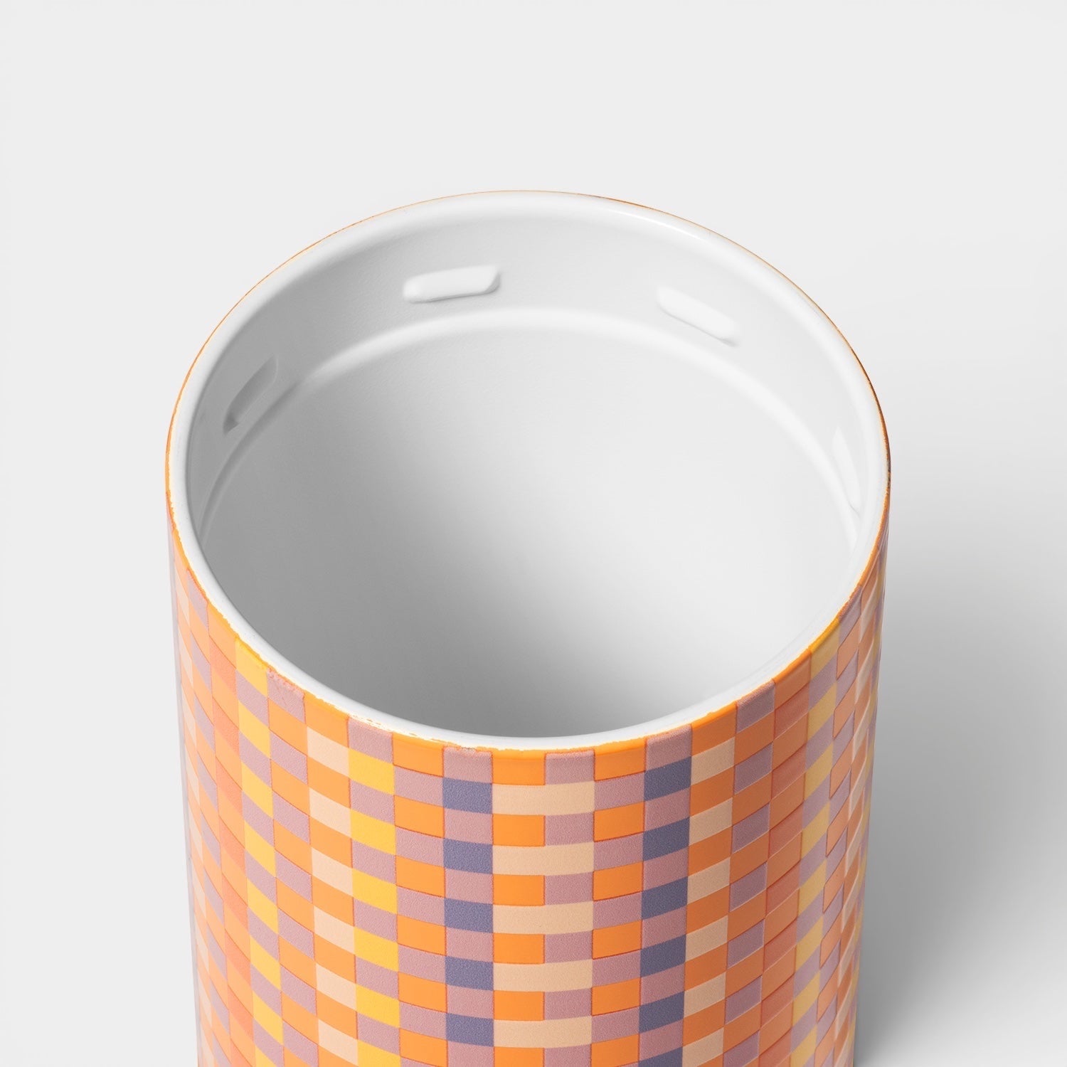 Read's Uniforms Brumate Strova 18oz tumbler with a ceramic-lined interior and orange checkered pattern exterior.