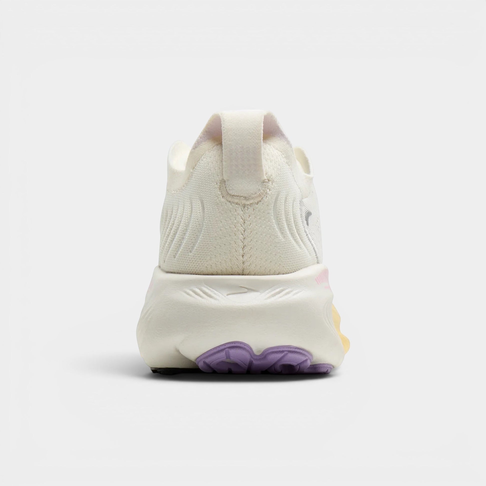 Read's Uniforms Adrenaline GTS 25 women's running shoe in cream with purple and yellow accents on the sole. Features breathable mesh upper and GuideRails support.