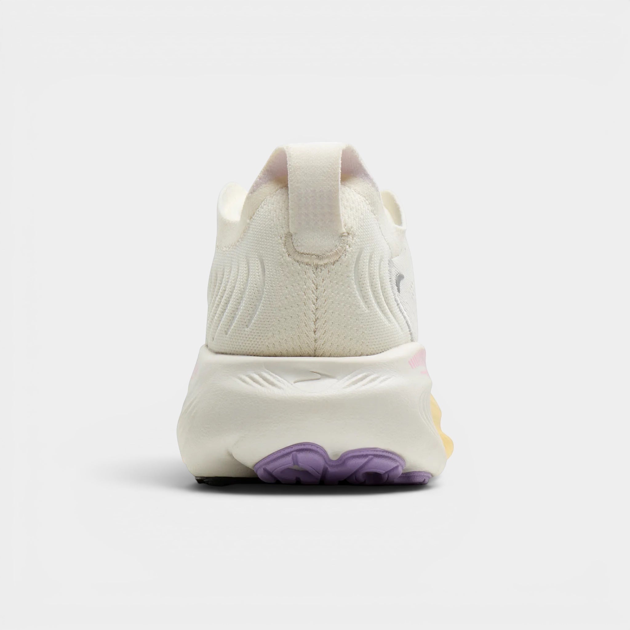 Read's Uniforms Adrenaline GTS 25 women's running shoe in cream with purple and yellow accents on the sole. Features breathable mesh upper and GuideRails support.