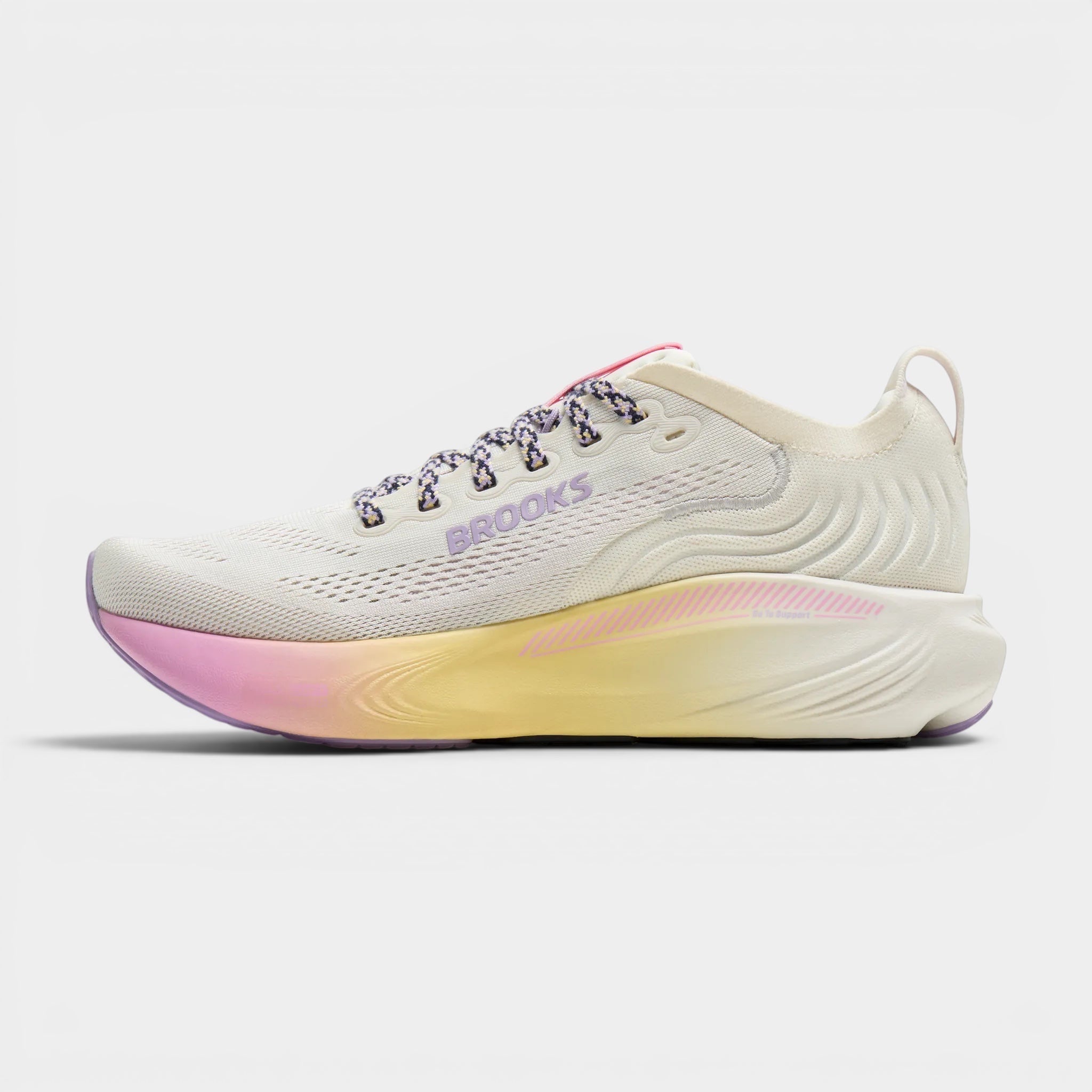 Read's Uniforms women's Adrenaline GTS 25 running shoe in cream with purple and yellow gradient sole. Features breathable mesh upper and patterned laces.