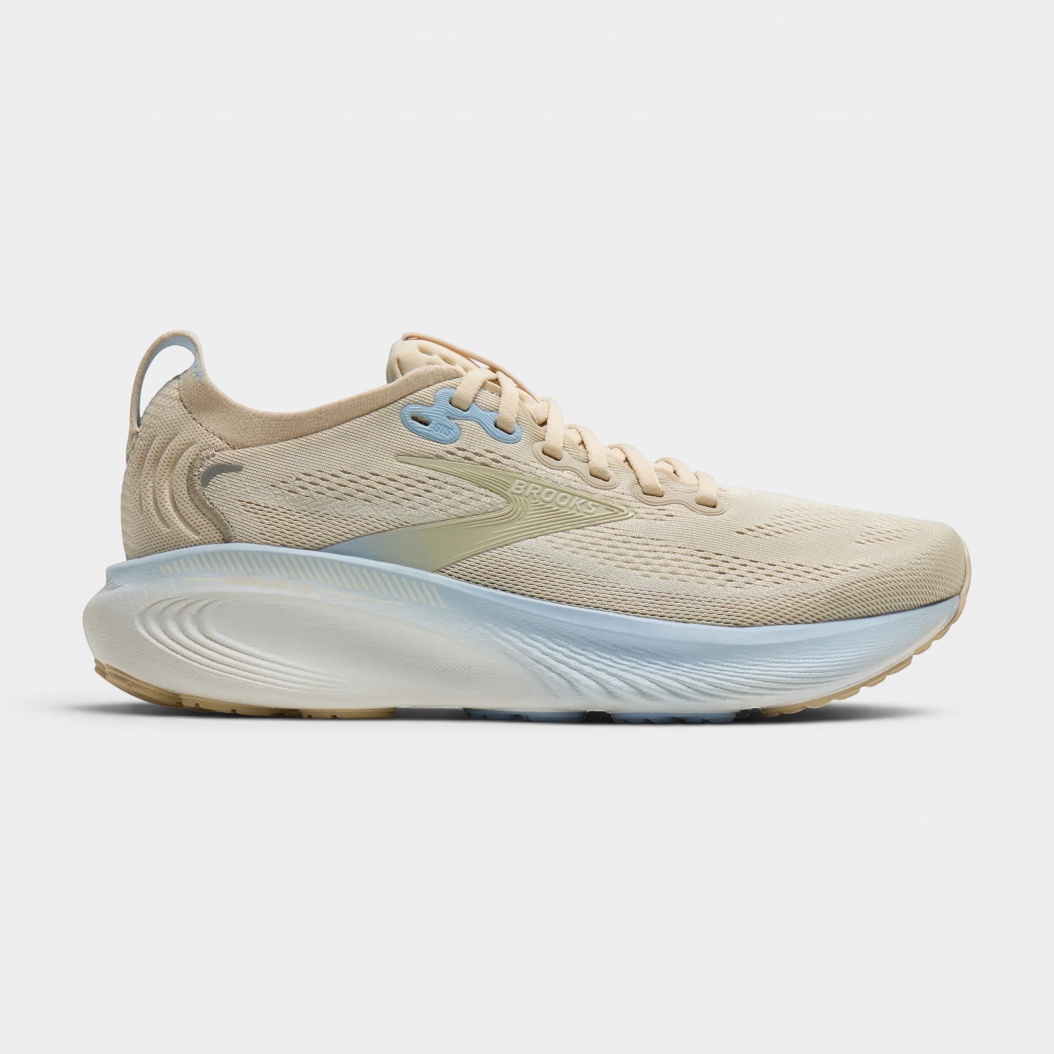 Read's Uniforms Adrenaline GTS 25 women's running shoe in beige with light blue accents. Breathable mesh upper and cushioned sole.