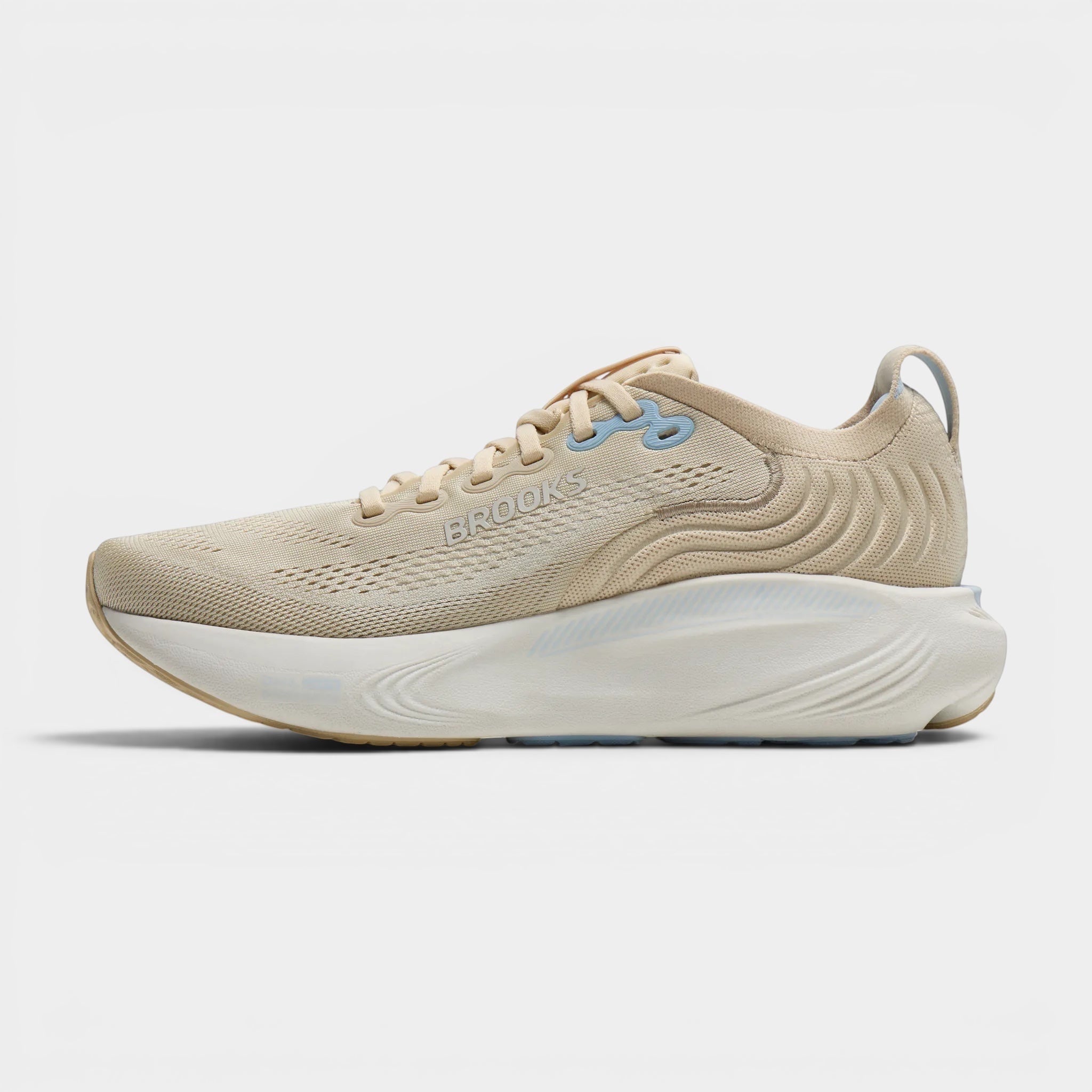 Read's Uniforms Adrenaline GTS 25 women's running shoe in beige with blue accents. Features breathable mesh upper and balanced cushioning.