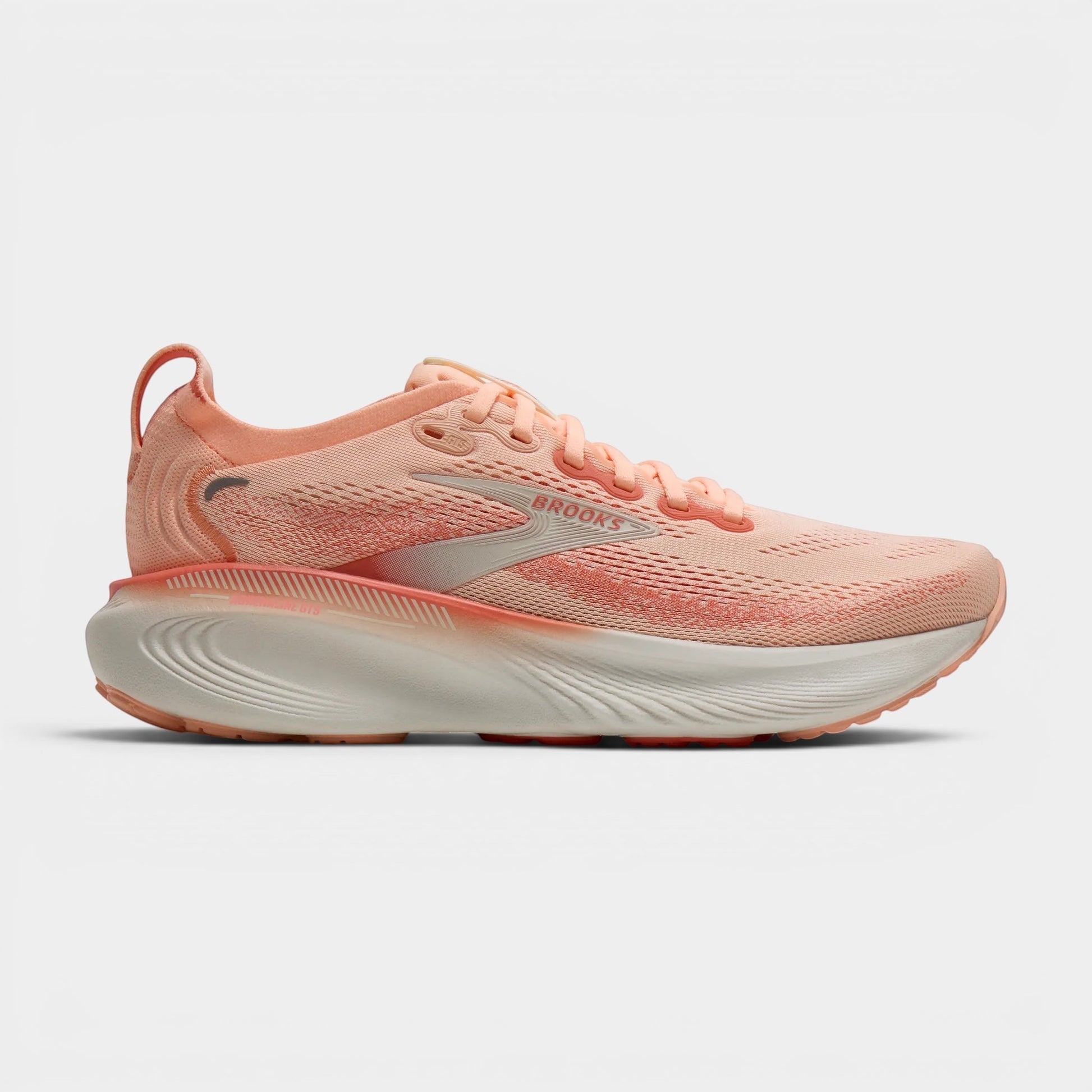 Read's Uniforms Adrenaline GTS 25 women's coral mesh running shoe with GuideRails support and balanced cushioning.