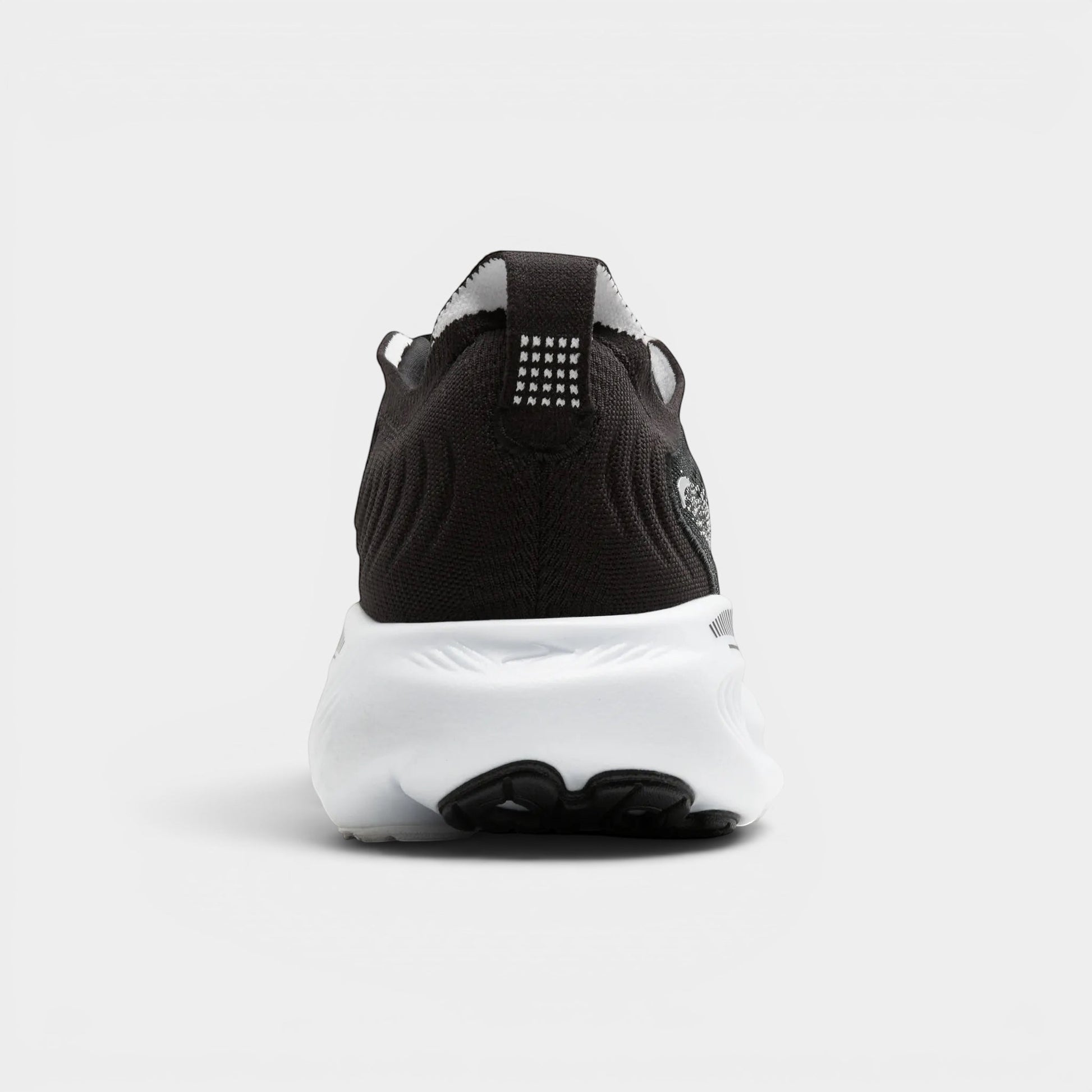 Read's Uniforms Adrenaline GTS 25 black and white knit running shoe, rear view.