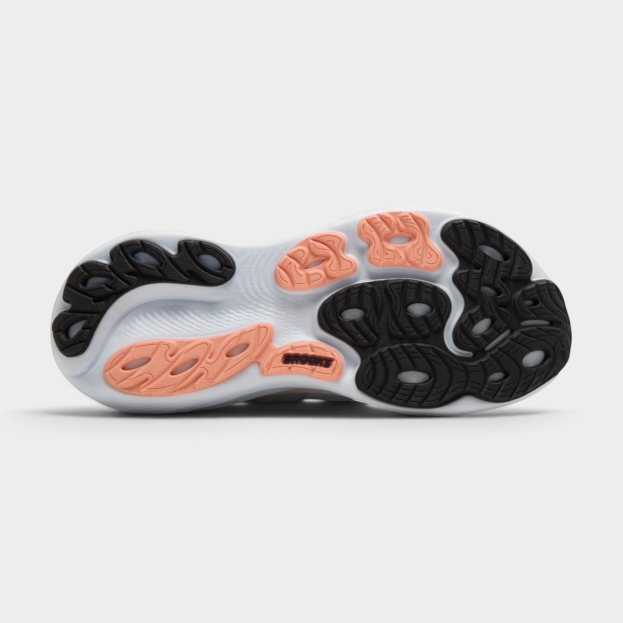 Read's Uniforms Adrenaline GTS 25 running shoe sole with black and coral rubber pods on a white midsole.