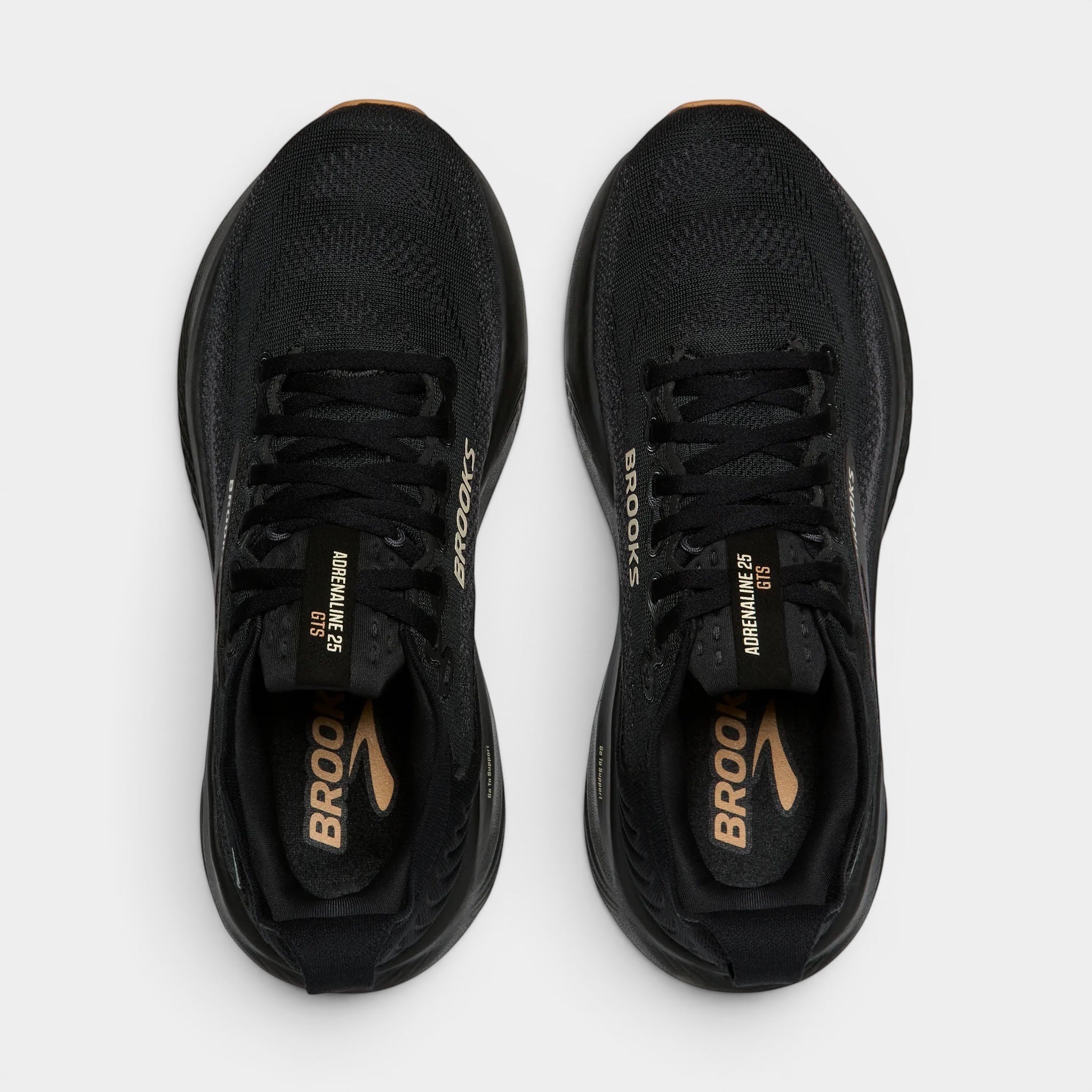 Read's Uniforms black mesh Brooks Adrenaline 25 GTS running shoes with gold accents and laces.