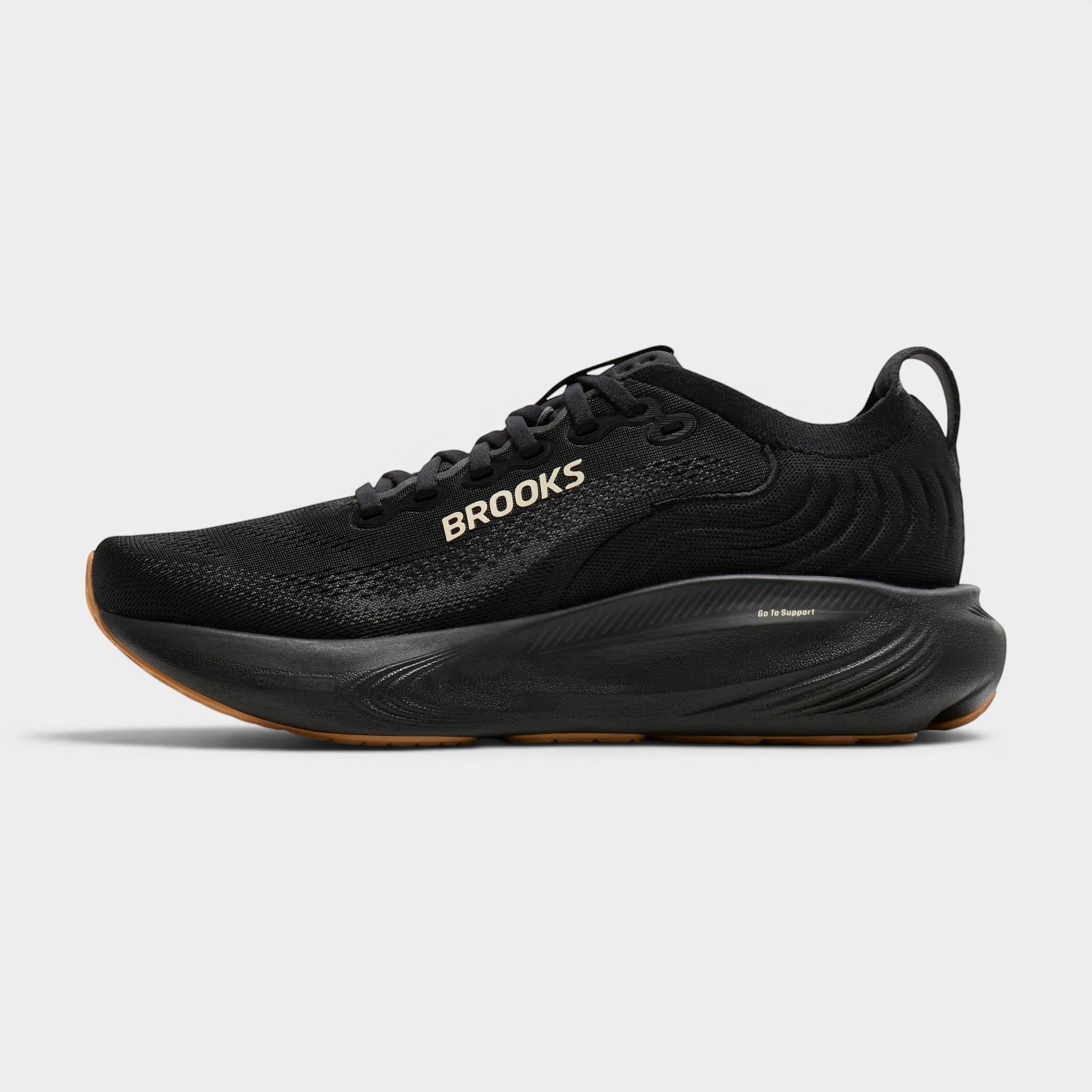 Read's Uniforms black Brooks Adrenaline GTS 25 running shoes with a gum sole and textured heel.