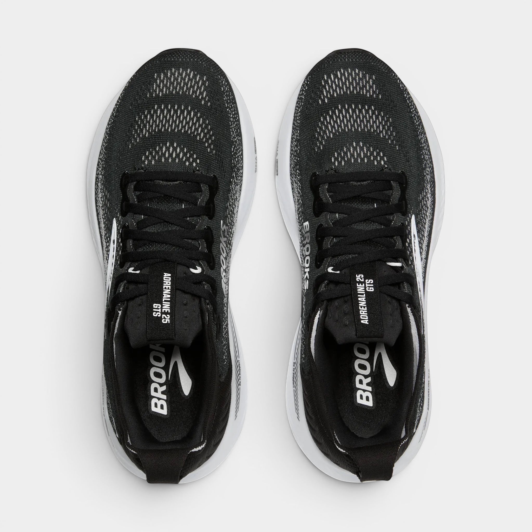 Read's Uniforms black and white Brooks Adrenaline GTS 25 running shoes with mesh uppers and white soles.